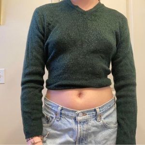 Green v-neck sweater
